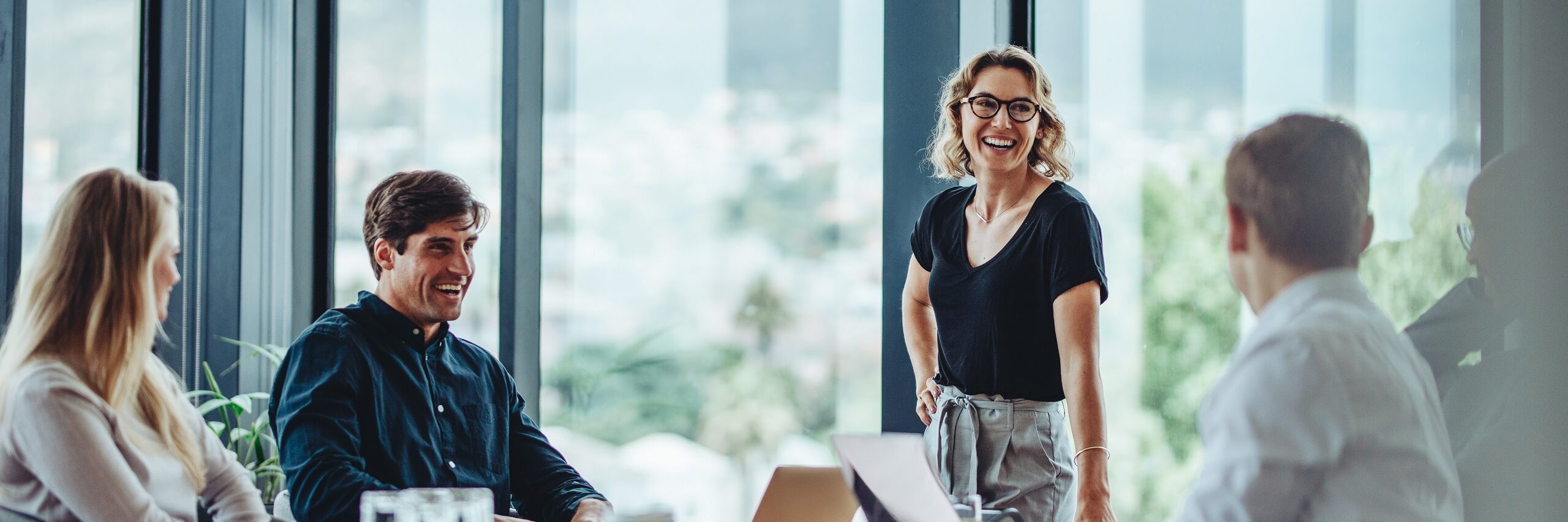 A woman is running effective meetings
